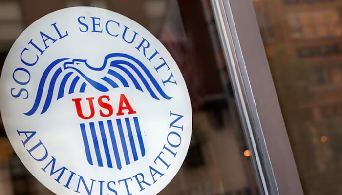 A sign is seen on the entrance to a Social Security office in New York City, US, July 16, 2018. — Reuters