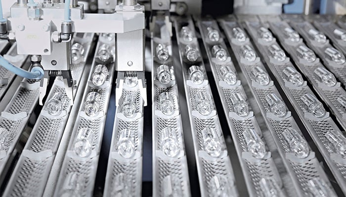 Vials made with borosilicate glass, the material which will be used in vials or syringes to hold the eventual coronavirus disease (COVID-19) vaccine, are seen during the production process at an undisclosed location in this 2013 handout image courtesy of Schott AG. — Reuters