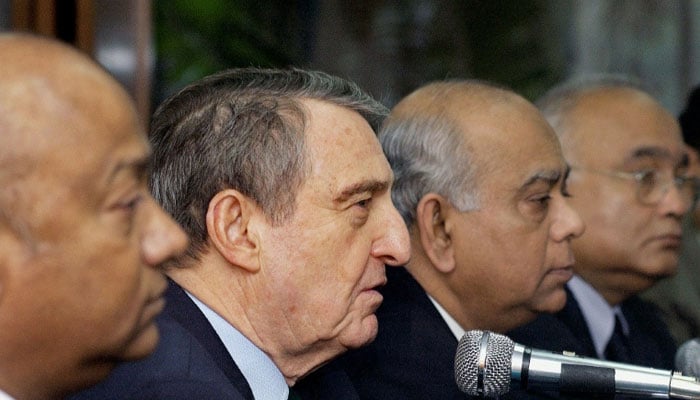 Rahmi Koc, pictured second on the left in 2004, a year after he stepped down as chairman of Koc Holdings. —AFP/File