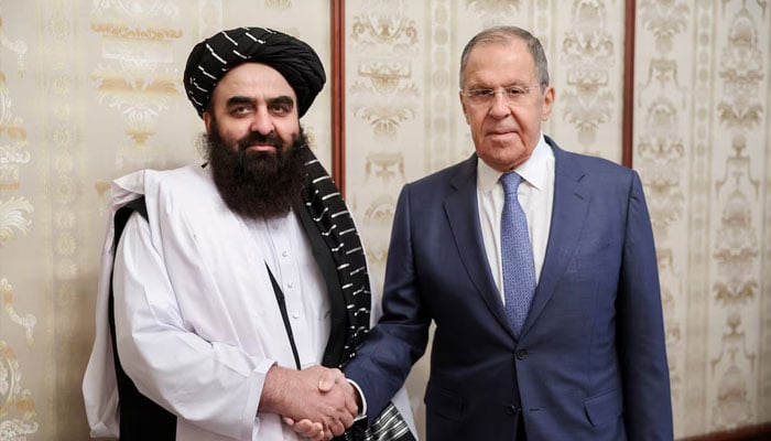 Russian Foreign Minister Sergei Lavrov shakes hands with Acting Foreign Minister of Afghanistans Taliban movement Amir Khan Muttaqi during a meeting in Moscow, Russia, October 4, 2024.—Reuters