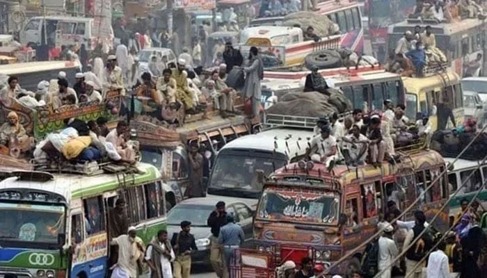 This representational image shows buses and other public transport vehicles filled with passengers. — AFP/File