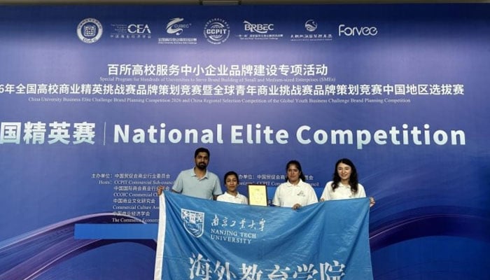 Participants pose for a photo in this image. — INP/File