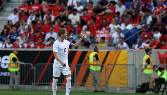 Norway captain Martin Odegaard takes the applause after his equalizer in a 1-1 draw with Morocco. —AFP