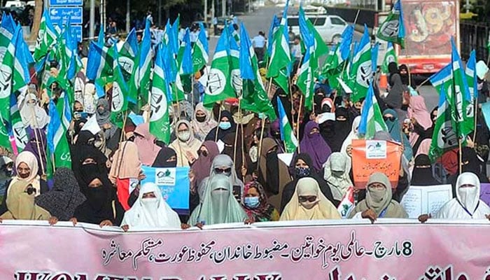 Jamaat-e-Islami Pakistans Women Wing participates in a rally on International Womens Day. — APP/File