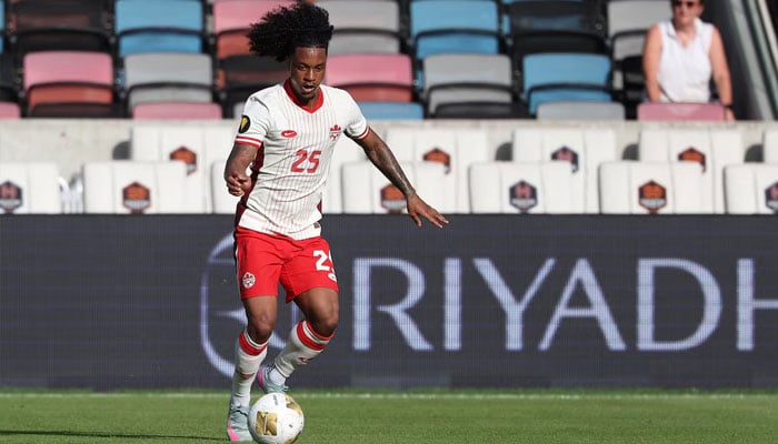 Canada forward Jayden Nelson (25) dribbles the ball during the first half against Curacao during a group stage match of the 2025 Gold Cup at Shell Energy Stadium.—Reuters