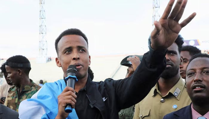 Somali referee Omar Abdulkadir Artan, who was expected to officiate at matches during the 2026 FIFA World Cup but was denied entry to US, addresses fans at the Mogadishu stadium, in Mogadishu, Somalia, June 10, 2026. —Reuters
