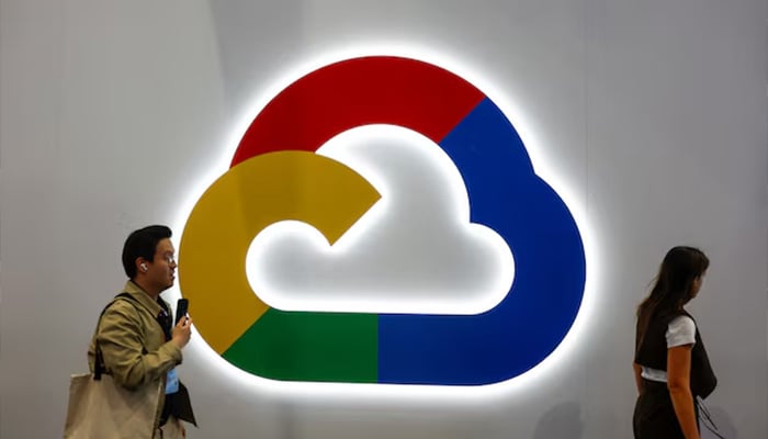 People walk next to the Google Cloud logo, during the 2025 Mobile World Congress (MWC) in Barcelona, Spain, March 4, 2025. — Reuters