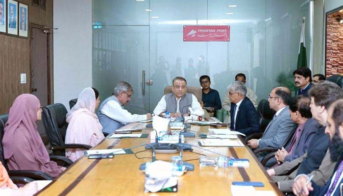 Federal Minister for Communications Abdul Aleem Khan presides over a high-level meeting of the Directorate General of Pakistan Post on June 11, 2026. — APP