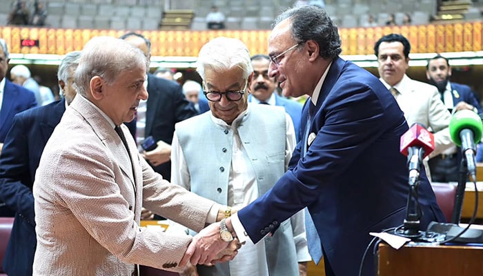Prime Minister Shehbaz Sharif meets with the parliamentarians during the budget session of the National Assembly in Islamabad on June 12, 2026. — APP