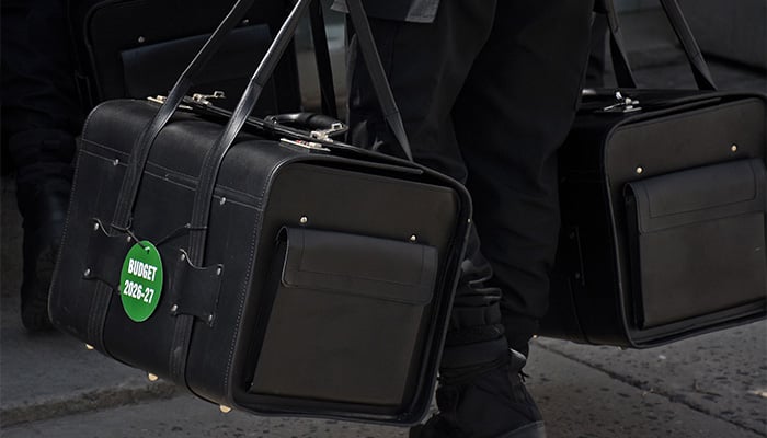 Police commandos from Federal Board of Revenue (FBR) shift boxes with copies of the 2026–27 fiscal budget outside the Parliament House in the Federal Capital, before the start of the budget session, in Islamabad, on June 12, 2026. — Online