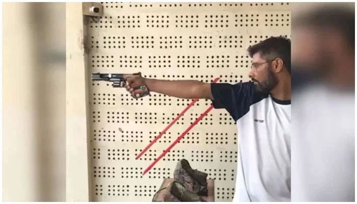 Representational image of a person shooting can be seen in this undated photo.— APP/File
