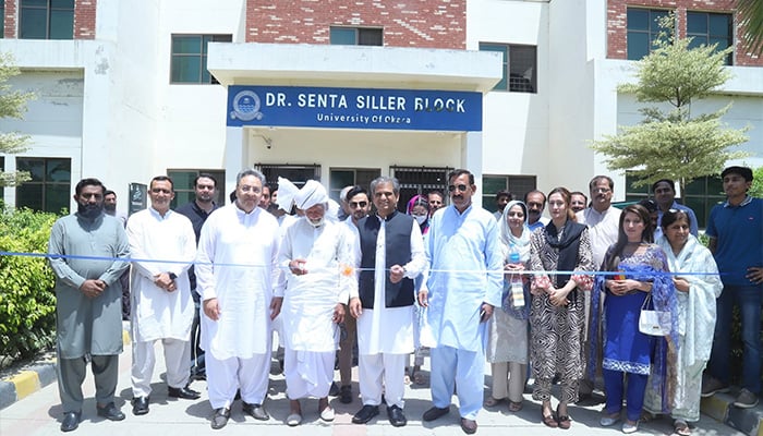 University of Okara Vice Chancellor, Prof Dr Sajjad Mubin, accompanied by members of civil society and the university faculty, inaugurates Dr Senta Siller Block, formerly known as PhD Block, on June 13, 2026. — Facebook/@okarauniversityofficial