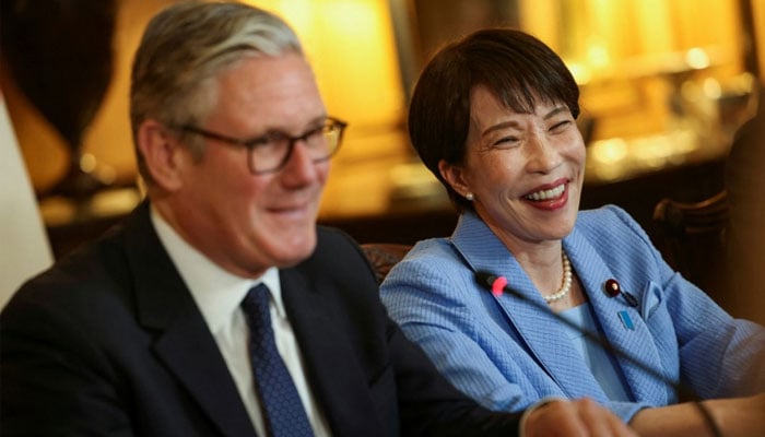 British Prime Minister Keir Starmer and Japanese Prime Minister Sanae Takaichi held talks at Downing Street ahead of them both going to a G7 summit in France that starts Monday. —AFP