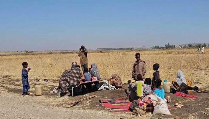 Displaced Sudanese rest in Gedaref, in eastern Sudan, last year. —AFP/File