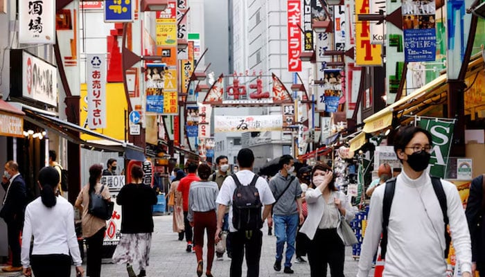 People make their way at Ameyoko shopping district in Tokyo, Japan, May 20, 2022. — Reuters