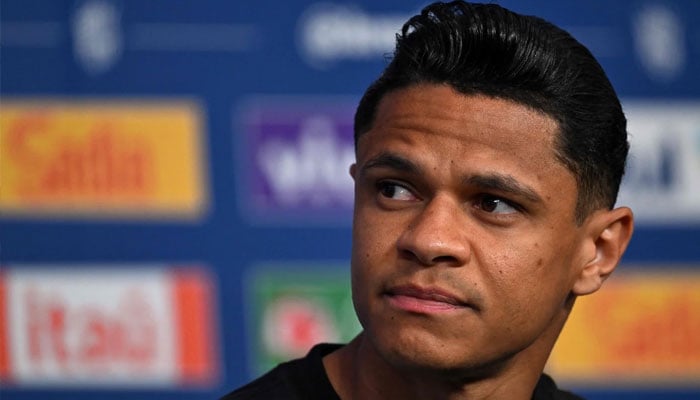 Brazils defender Douglas Santos gives a press conference during the 2026 World Cup tournament at the Ridge Hotel in New York on June 16, 2026.— AFP