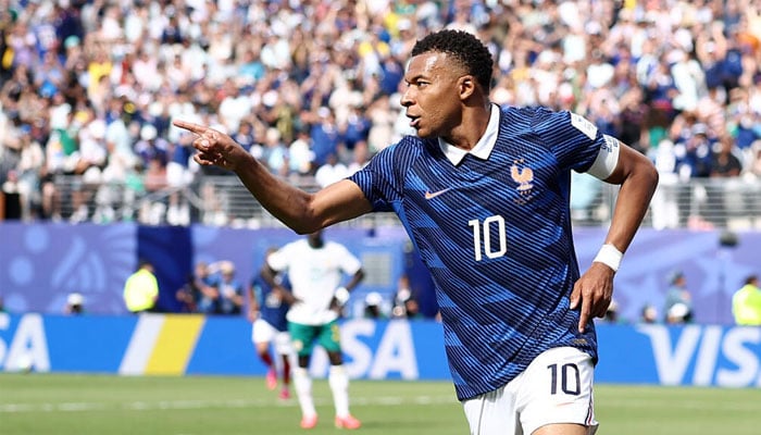 Kylian Mbappe celebrates after scoring Frances opening goal against Senegal at the World Cup on Tuesday. —AFP