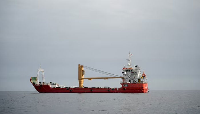 A vessel at the Strait of Hormuz, off the coast of Oman’s Musandam province, April 12, 2026.—Reuters