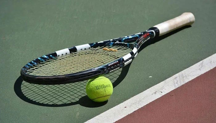Representational image of tennis racket and ball. — APP/File