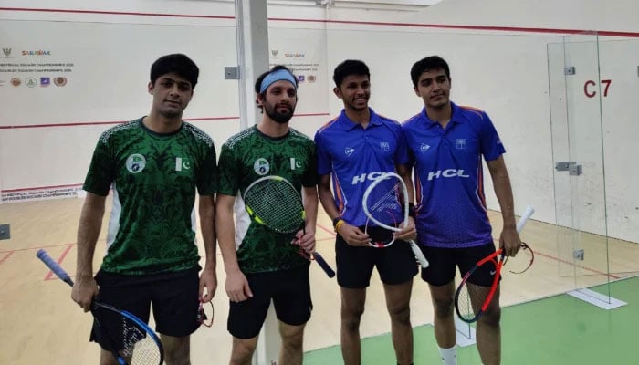 Pakistans Noor Zaman (far left) and and Nasir Iqbal (second from left) pose with Indian players Abhay Singh and Velavan Senthilkumar after the final of the Asian Doubles Squash Championship in Kuching, Malaysia, on June 25, 2025. — Reporter/Faizan Lakhani