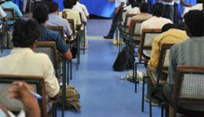 Representational image shows students taking a lesson in class. — AFP/File