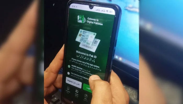 This image, taken on January 29, 2026, shows a person opening the PAK-ID app on his mobile in Karachi. — Geo.tv/Kashif Suri