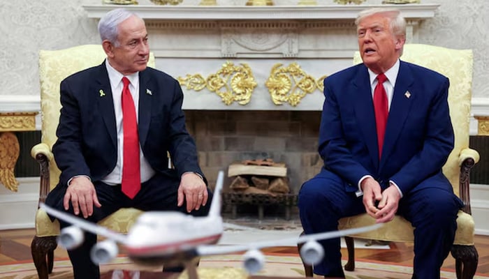 US President Donald Trump talks to Israeli Prime Minister Benjamin Netanyahu during a meeting, Washington, US, April 7, 2025. — Reuters