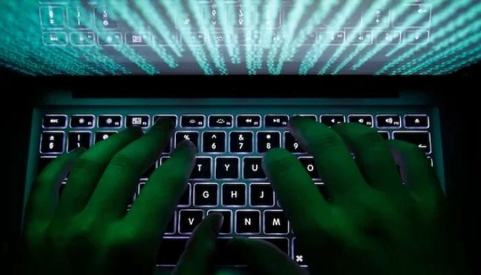 This representational images shows a man typing on a computer keyboard. — Reuters/File