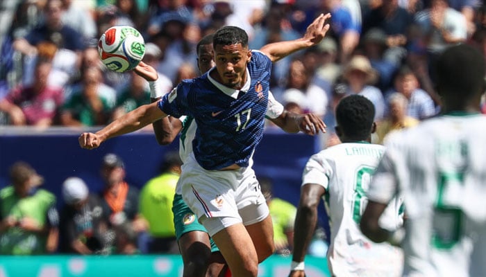 France centre-half William Saliba in action. —AFP