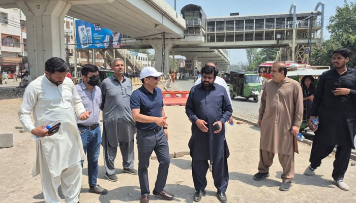 Lahore Development Authority (LDA) Director General Tahir Farooq (centre left) visits a development project in the City on June 21, 2026. — Facebook@LahoreDevelopmentAuthority