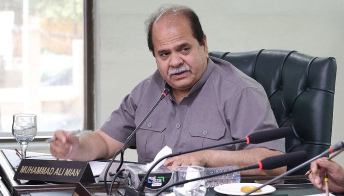 Former president of the Lahore Chamber of Commerce and Industry, Muhammad Ali Mian is seen during a meeting on June 11, 2026. — Facebook@mohammadali.mian