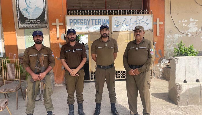 Punjab Police personnel standing outside the Presbyterian Church in the city on June 21, 2026. — Facebook@punjabpolicecpo