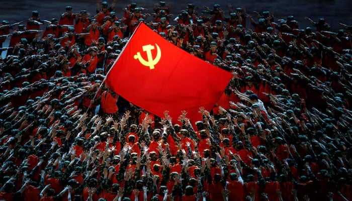 Performers rally around the Red Flag during a show commemorating the 100th anniversary of the founding of the Communist Party of China at the National Stadium in Beijing, China, June 28, 2021. — Reuters