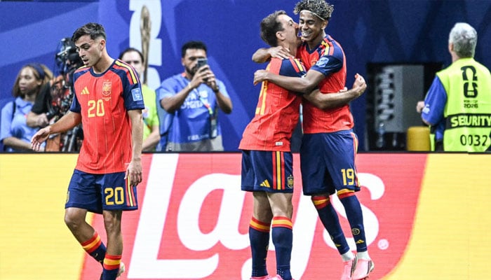 Spains Lamine Yamal (right) celebrates with teammates after opening the scoring in a 4-0 thrashing of Saudi Arabia. —AFP