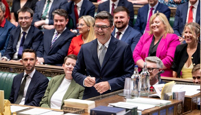 British new Member of Parliament (MP) for Makerfield, Andy Burnham, reacts as he attends his swearing-in ceremony at the House of Commons, in London, Britain.—Reuters