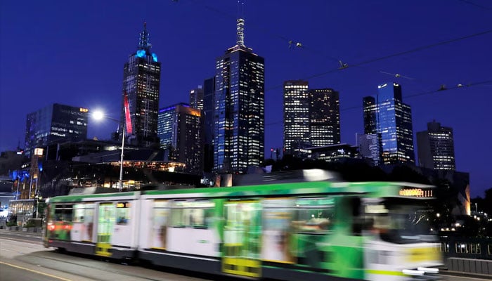 The city skyline is seen as a tram crosses the Princes Bridge at dusk in Melbourne, Victoria, Australia, February 4, 2020.—Reuters