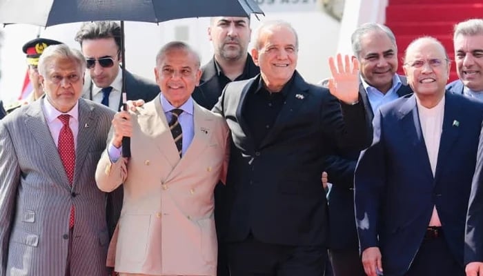 Iranian President Masoud Pezeshkian (second from right) lands in Islamabad on June 23, 2026. — X/@GovtofPakistan