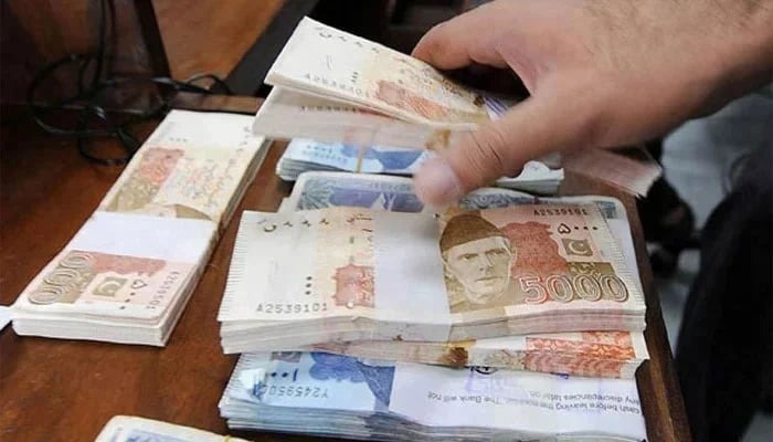 Stacks of Pakistani currency notes seen in this undated image. — AFP/File