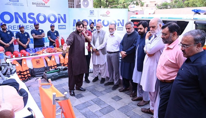 Patron of Al-Khidmat Foundation Lahore, Zia-ud-Din Ansari, Advocate, is being briefed about the upcoming monsoon rains in the Gulberg area on June 24, 2026. — Facebook@AlkhidmatFoundationPakistan