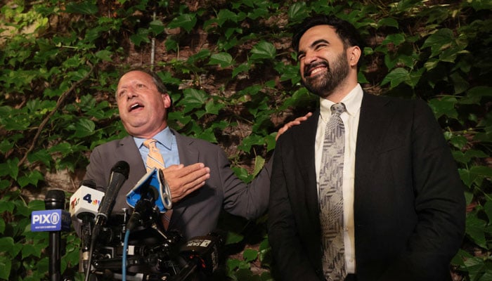 Democratic Congressional Candidate Brad Lander takes the stage with New York City Mayor Zohran Mamdani after winning the 10th District Democratic primary in Brooklyn on June 23, 2026, in New York City. — AFP