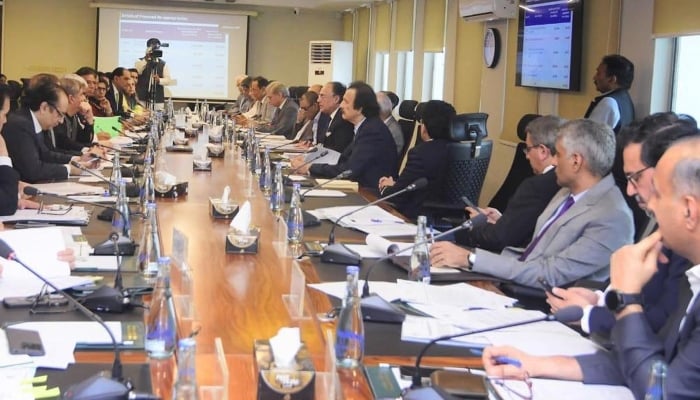 Federal Minister for Finance and Revenue, Senator Muhammad Aurangzeb chairing a meeting of the Economic Coordination Committee (ECC) of the Cabinet. — PID