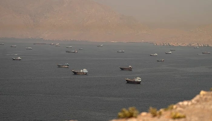 Vessels at the Strait of Hormuz, as seen from Musandam, Oman, June 18, 2026. — Reuters