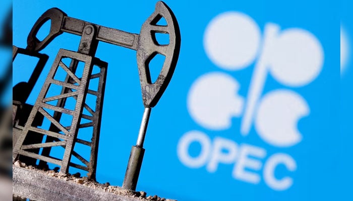 A 3D-printed oil pump jack is seen in front of a displayed OPEC logo in this illustration picture, April 14, 2020. — Reuters