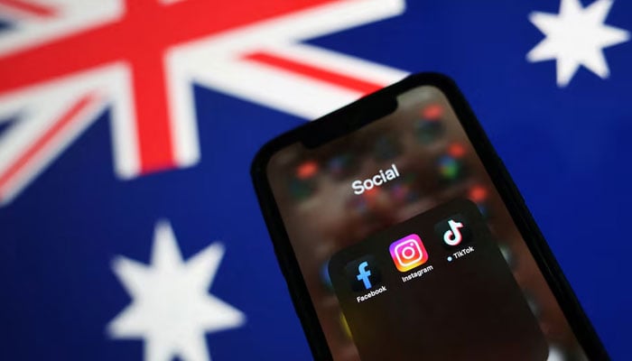 Facebook, Instagram and TikTok apps are seen on a smartphone in front of an Australian flag, in this illustration taken November 29, 2024. — Reuters