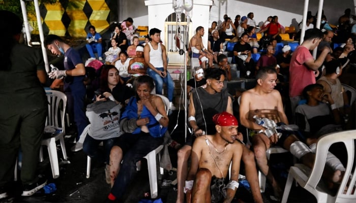 People rest as they receive treatment in a field hospital in the aftermath of earthquakes, in La Guaira, Venezuela, June 24, 2026. — Reuters