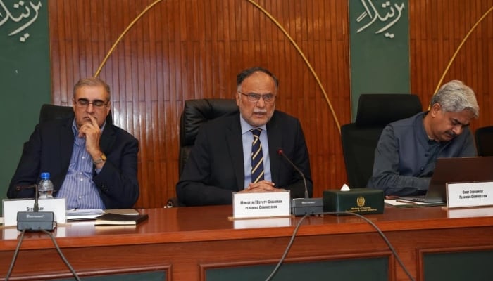 Federal Minister for Planning, Development and Special Initiatives and Deputy Chairman of the Planning Commission Professor Ahsan Iqbal chairing a meeting of the Central Development Working Party (CDWP). — PID/File