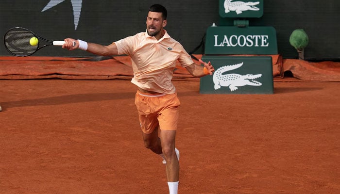 Novak Djokovic of Serbia returns a shot during his match against Joao Fonseca of Brazil on day six at Stade Roland Garros.—Reuters