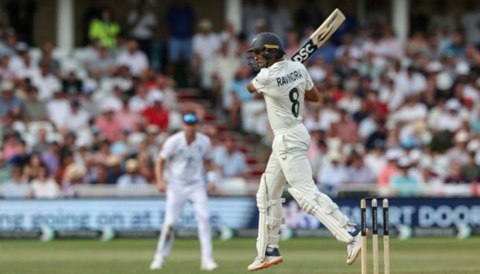 New Zealands Rachin Ravindra drives on his way to 60 not out in the third Test against England at Trent Bridge. —AFP/File