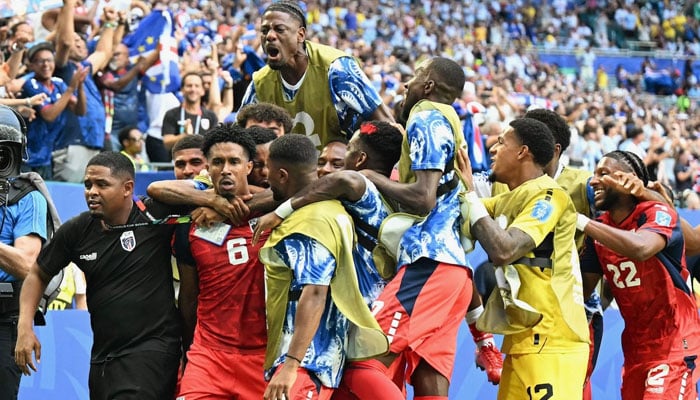 Cape Verde midfielder Kevin Pina celebrates with teammates after scoring his team’s first goal during the 2026 World Cup Group H football match between Uruguay and Cape Verde at the Miami Stadium in Miami Gardens on June 21, 2026.— AFP
