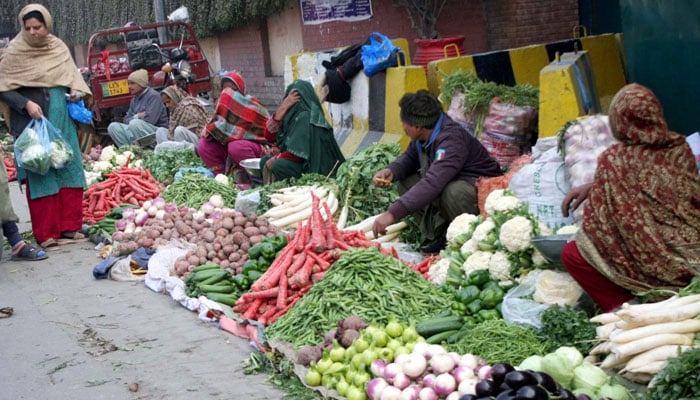 Vendors sell vegetables at the Islampura area in Lahore on January 11, 2026. — PPI